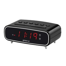 Digital alarm clock with FM