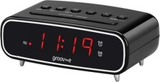 Digital alarm clock with FM
