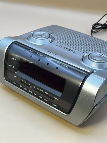 Alarm radio clock with - alarm,